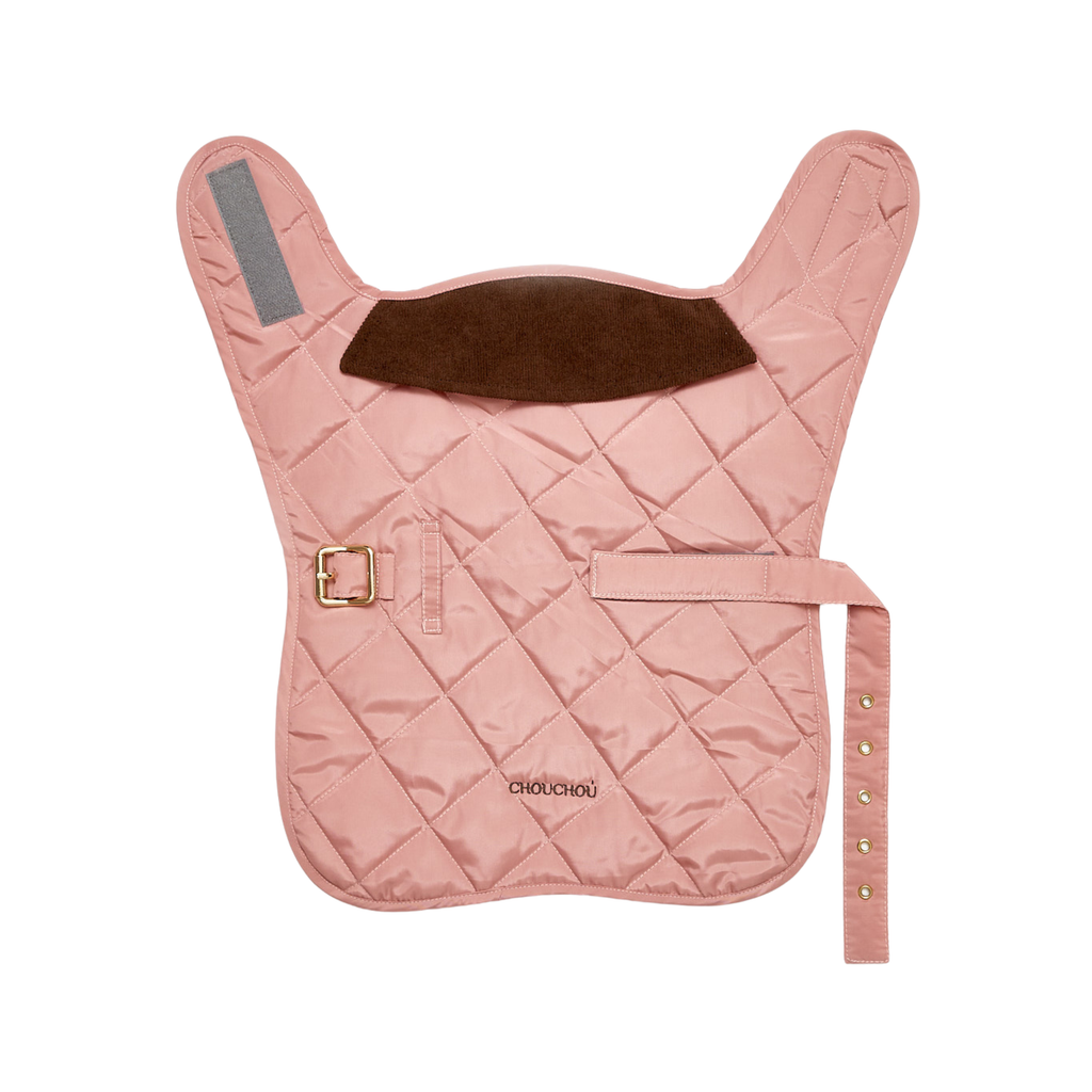 Fully expanded against a stark white backdrop, the delicate pink rain-resistant fabric reveals its diamond-quilted texture and the symmetrical layout of the heavy-duty fastening system.