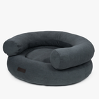 Charcoal velvet upholstery defines the structured perimeter of this premium canine lounge, presented in a crisp isometric stance.