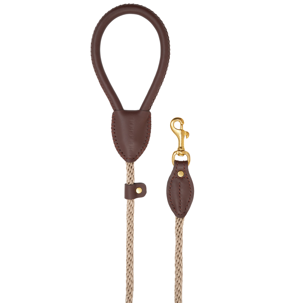 Clean vertical display of the classic dark brown Italian leather dog leash, emphasizing the seamless transition into the heavy-duty rope.
