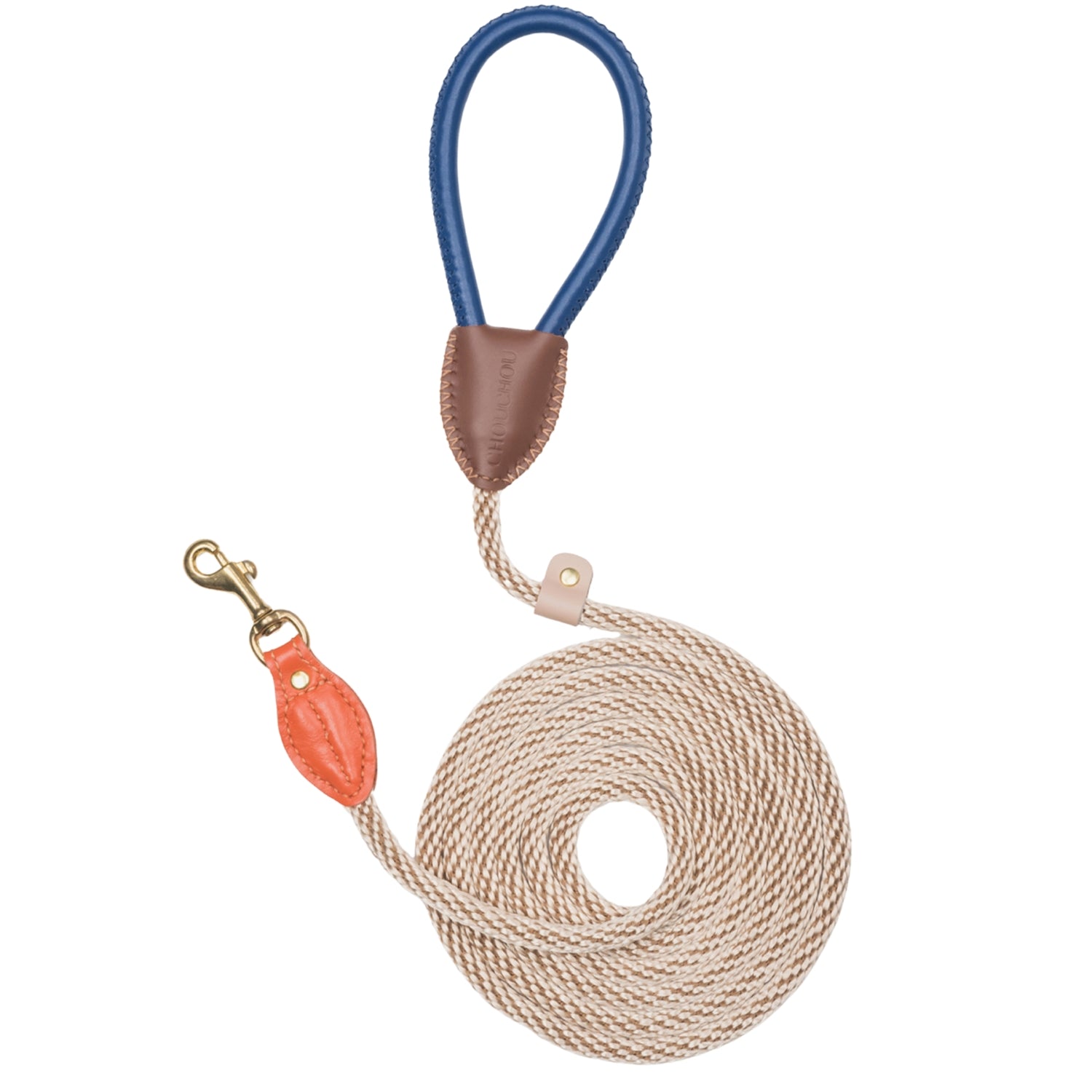 Artistic flatlay of the Chromatique color-block walking leash, highlighting the bold blue leather handle and earthly beige rope core by CacheMio & CHOUCHOÚ.