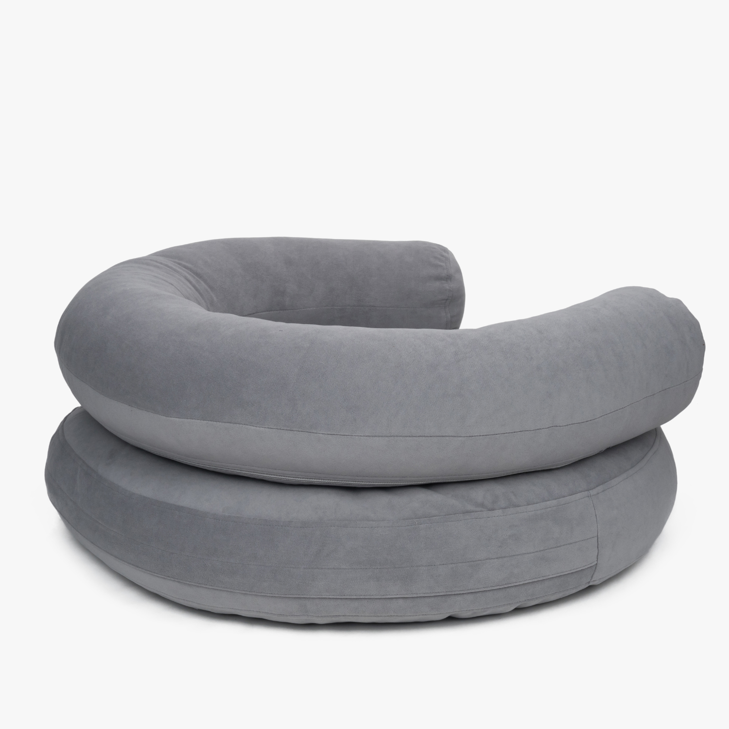 Concealed rear zipper lines maintain the pristine minimalist silhouette of the folded grey orthopedic resting space by CacheMio.