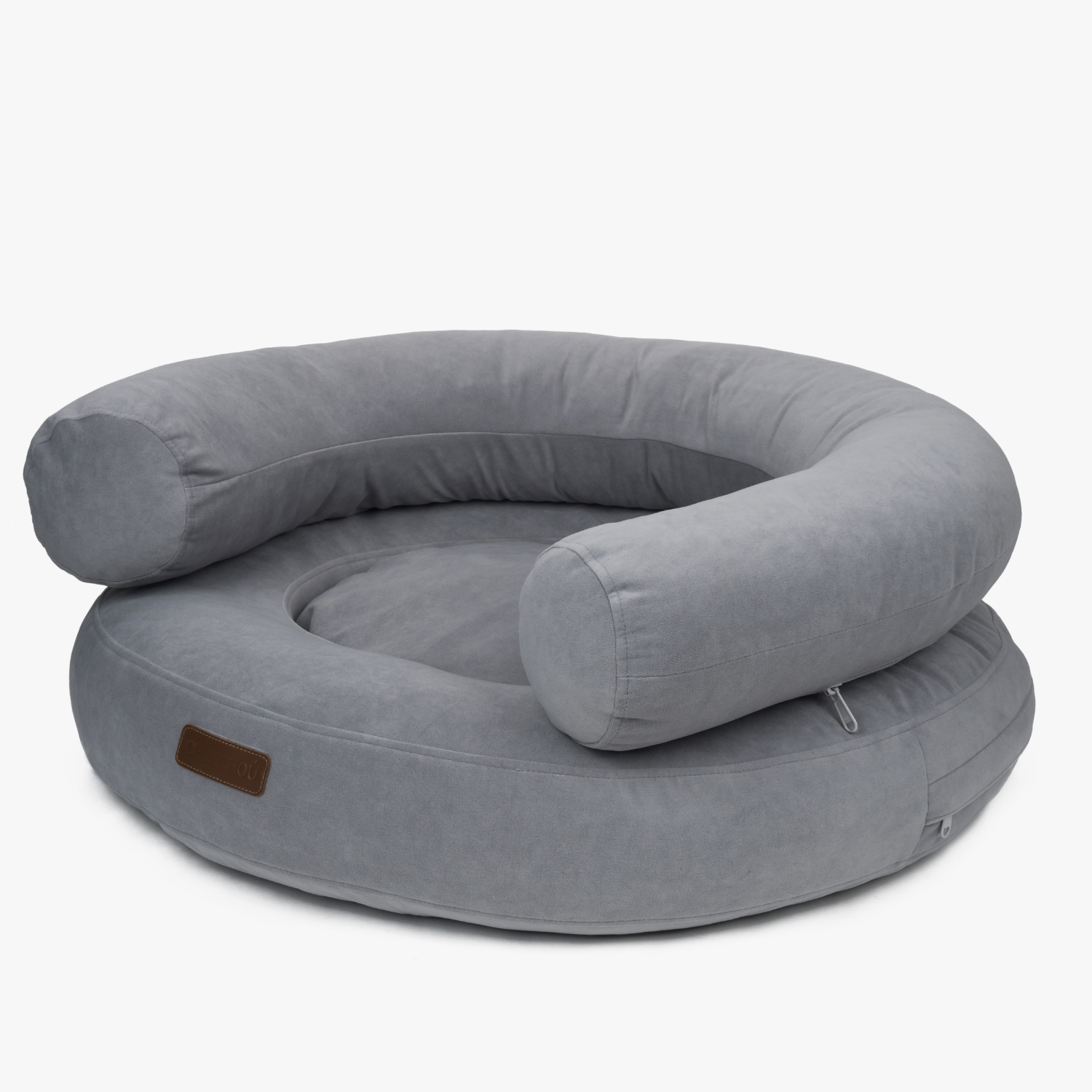 Cool ash velvet sweeps in a continuous plush curve, establishing the structural foundation of this premium silver-toned pet lounge.