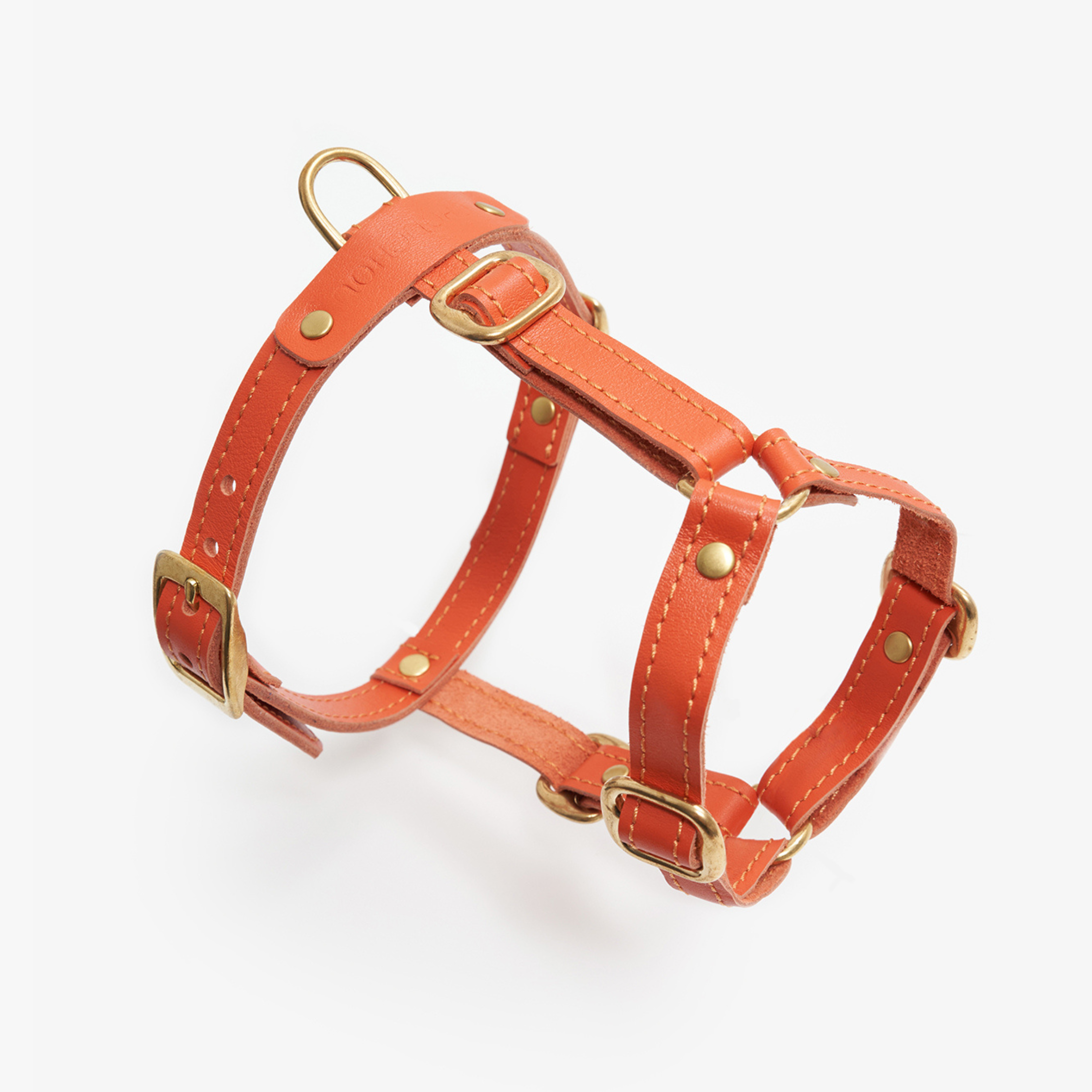Suspended display capturing the ergonomic curves and thick Italian leather craftsmanship of this high-visibility outdoor companion gear.