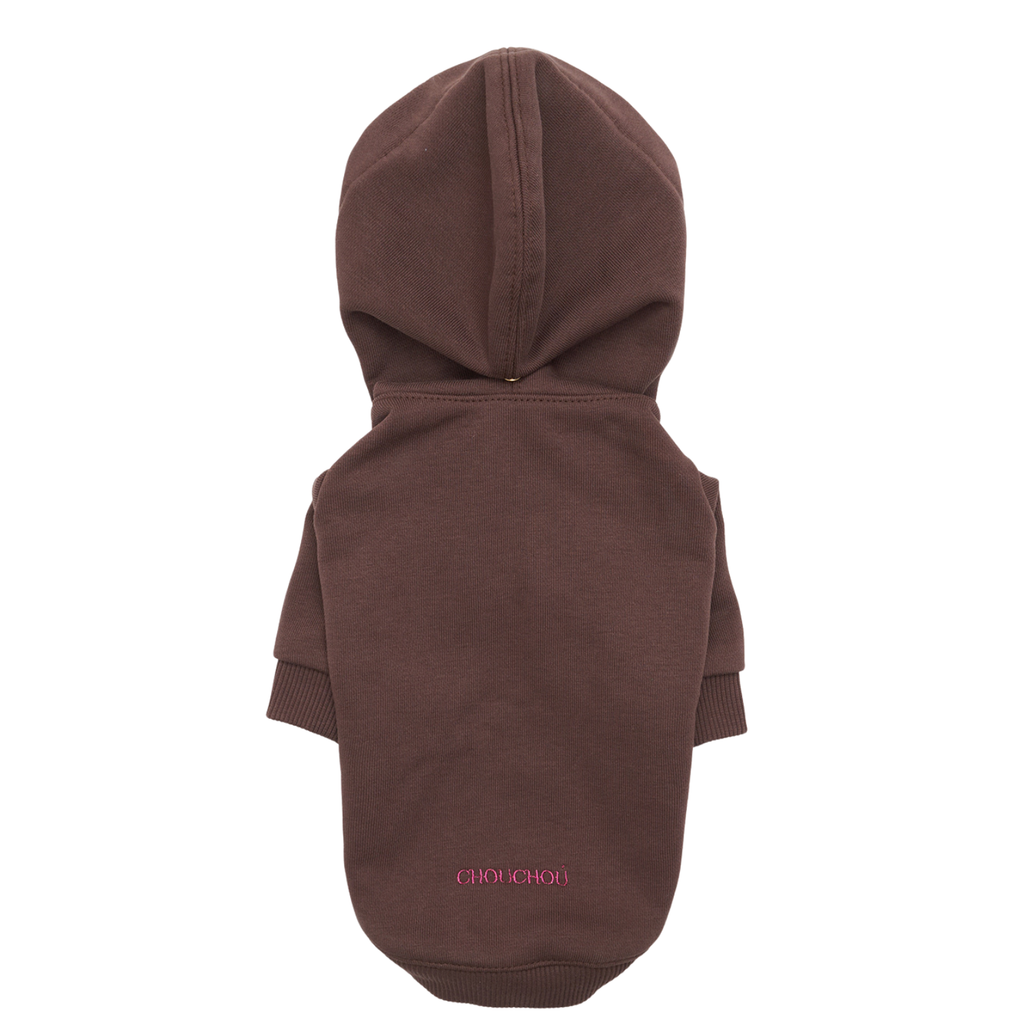 Delicate pink CacheMio atelier embroidery anchors the lower back of the dark brown pet sweater, emphasizing minimalist luxury on breathable woven fabric.