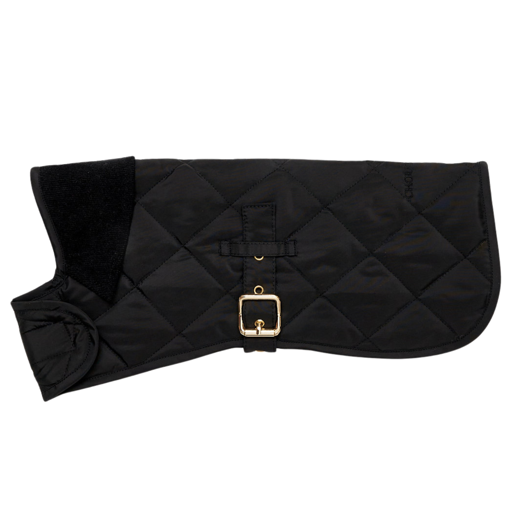 Side profile of the sleek midnight black waterproof dog coat by CacheMio x CHOUCHOÚ, emphasizing its urban monochrome aesthetic and tailored fit.