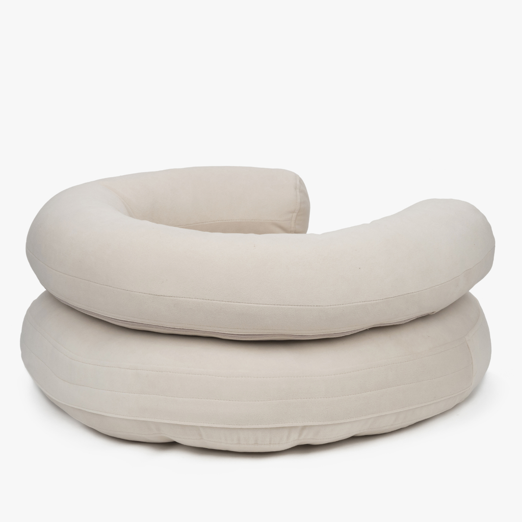 Clean lines and concealed zippers showcase the meticulous craftsmanship of the warm beige premium resting space for modern homes.