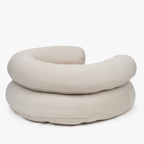 Clean lines and concealed zippers showcase the meticulous craftsmanship of the warm beige premium resting space for modern homes.