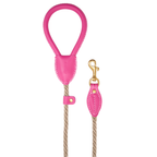 Clean aesthetic flatlay highlighting the fashion-forward design of the Hot Pink puppy lead, featuring kinetic shock-absorbing core engineering.