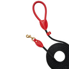 Bold red Italian leather dog leash handle and solid brass clasp by CacheMio & CHOUCHOÚ, integrated with a heavy-duty black rope.