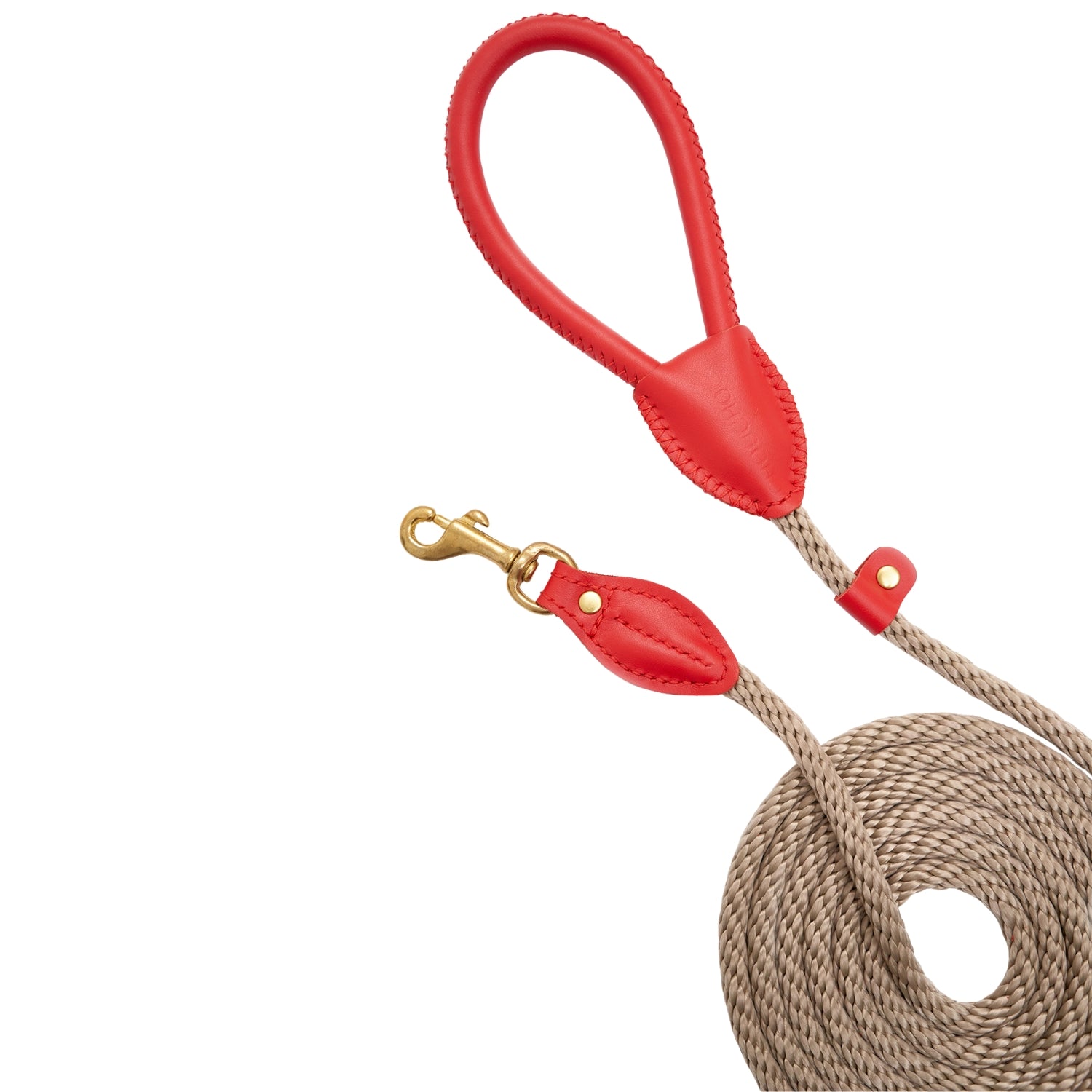 Striking red Italian leather dog leash handle and solid brass clasp by CacheMio & CHOUCHOÚ, connected by a durable beige rope core.