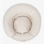 The expansive resting area of the neutral canine sofa exposes a deeply cushioned hypoallergenic core engineered for optimal spine alignment.