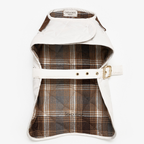 Unfurled to reveal its intricate interior, the garment exposes a classic brown and white plaid cotton lining. This breathable thermal layer is bordered by the pristine, water-resistant outer fabric.