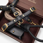 Bespoke magnetic presentation box housing the stealth-oriented walking set, focusing on the lustrous metal hardware against dark textures.