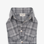 The structured collar opens to reveal the signature CHOUCHOÚ atelier label, emphasizing the sartorial excellence of this breathable cotton dog apparel.
