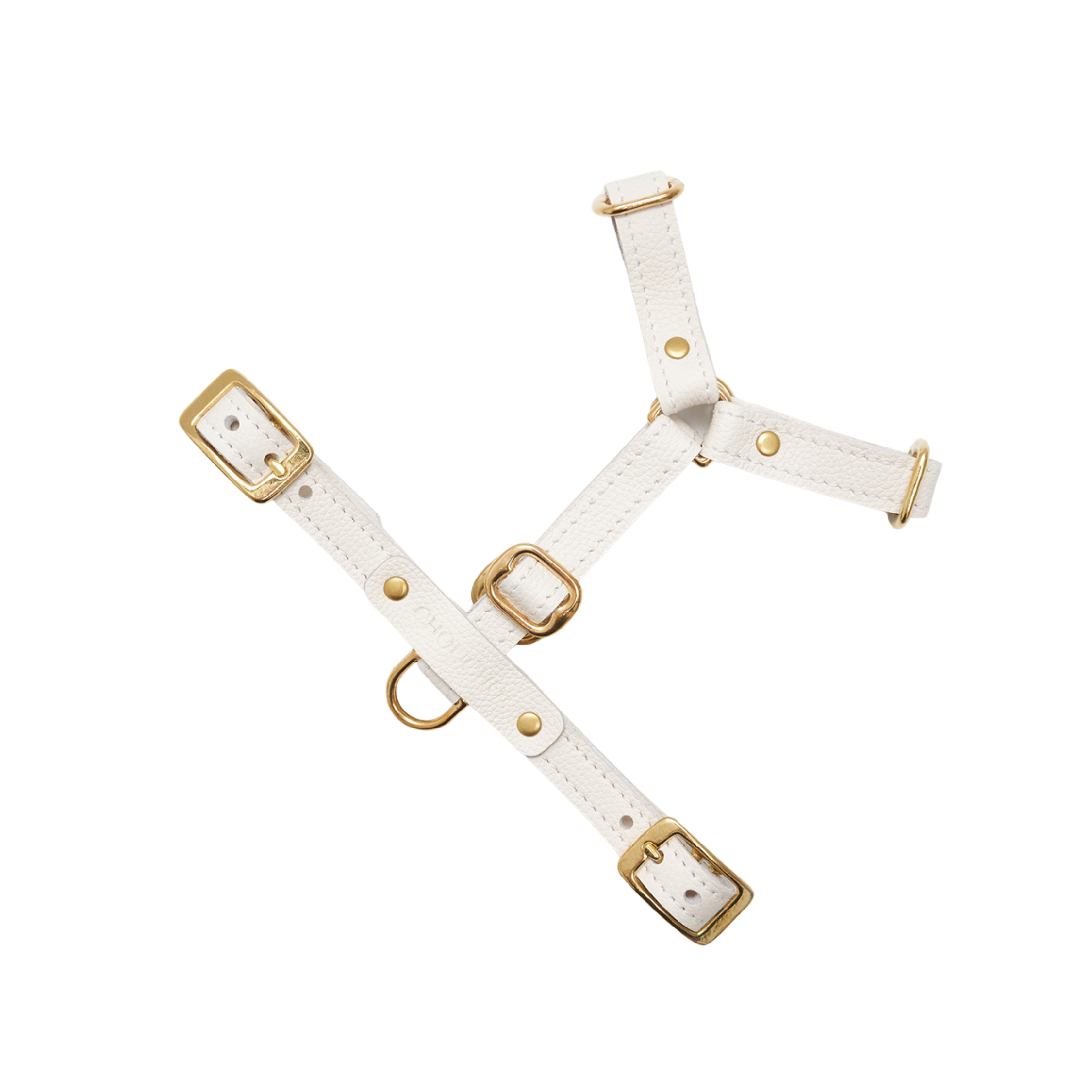 Laid completely flat, the unblemished milk white leather gear reveals its symmetrical load-bearing design and reinforced hand-stitched borders.